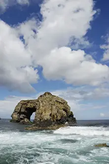 Eroding Prints: Rock hollowed-out by the force of the waves