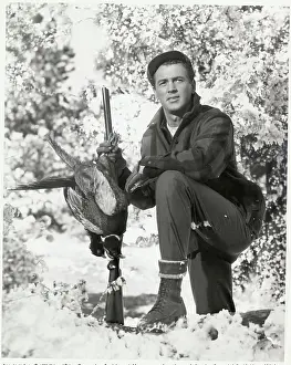 Rock Hudson Posing with His Hunting Prizes