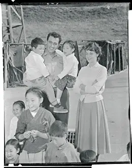 Rock Hudson and Wife with Korean Orphans
