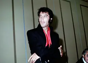 Rock and roll musician Elvis Presley gives a press conference