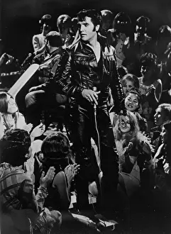 Rock and roll musician Elvis Presley performing on the Elvis comeback TV special