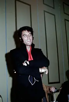 Rock and roll musician Elvis Presley during a press conference