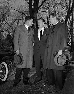 Rockefeller Men Standing Outside by Car