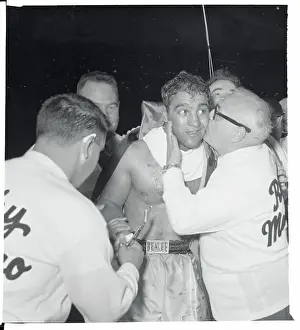 Rockey Marciano Being Congratulated for Win