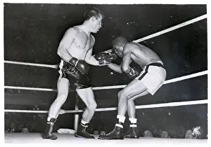 Rocky Graziano Backs Henry Brim Into Ropes