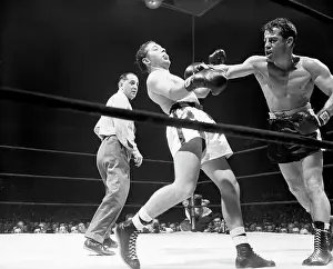 Match Prints: Rocky Graziano Delivering a Right