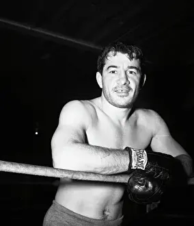 Rocky Graziano Leaning on Ropes in Ring