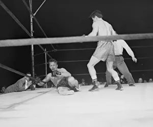 Rocky Graziano Looking Down on Tony Zale