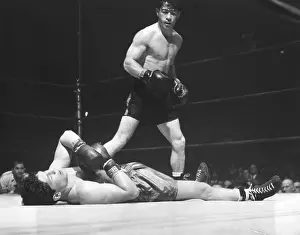 Rocky Graziano Stands Over Opponent