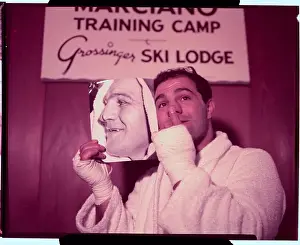 Rocky Marciano Holding Photo