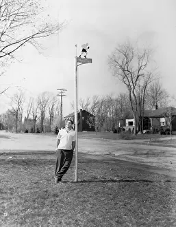 Mass Prints: Rocky Marciano Leaning Against Pole
