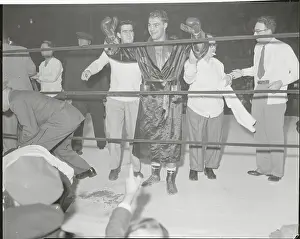 Rocky Marciano Raising His Fists After Win