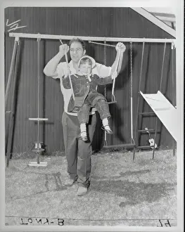 Mass Prints: Rocky Marciano Swinging Daughter Outside