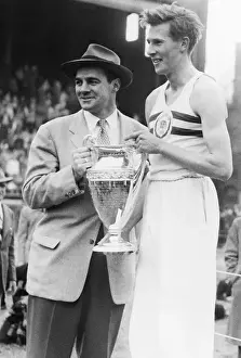 Jogger Prints: Roger Bannister Holding the Winner's Cup