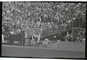 Roger Maris Jumping to Catch Baseball