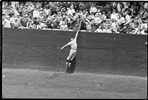 Roger Maris Jumping To Catch Home Run
