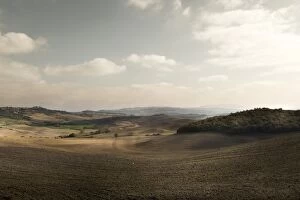 Rolling hills landscape of Val d Orcia after harvesting season