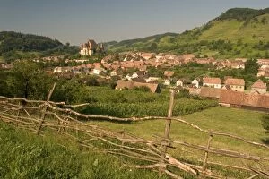 Romania, Sibiu, Biertan, townscape, fence in foreground