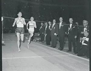 Ron Delany Crossing Finish Line