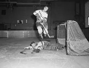Ron Murphy Jumping over Gump Worsley