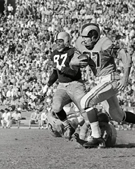 Ron Waller Running to Score a Touchdown