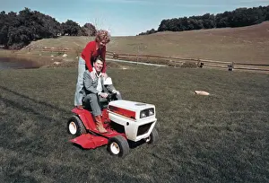 Santa Barbara Prints: Ronald and Nancy Reagan Riding Lawnmower