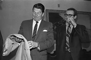 Sacramento Prints: Ronald Reagan Examining Jacket and Tie