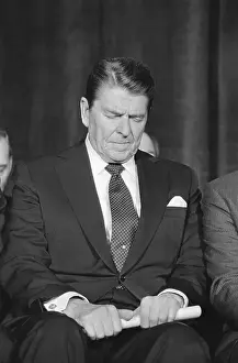 Ronald Reagan with Head Bowed