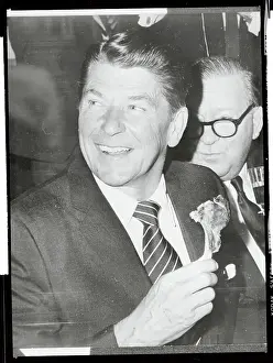 Ronald Reagan Holding a Lamb Chop