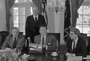 James G Prints: Ronald Reagan Presented with Meat Cleaver