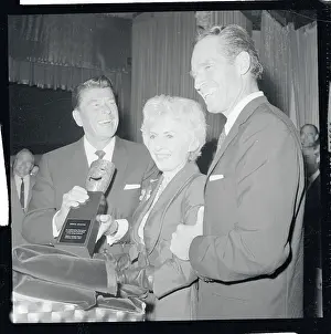 Ronald Reagan Presenting Award to Barbara Stanwyck