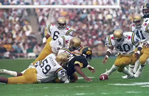 Competition Prints: Ronnie Harmon and Tommy Taylor Grabbing for Fumble