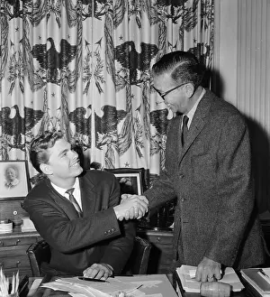 Ronnie Knox Shaking Hands With Dore Schary
