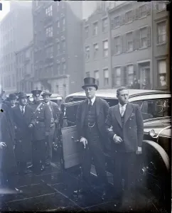 Governor Prints: Roosevelt Being Assisted Getting Out of Car-Arriving at John Voorhis Funeral