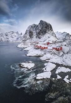 Wintry Gallery: Rorbuer fishermens cabins on the snowy fjord, village view of the fishing village Hamnoy