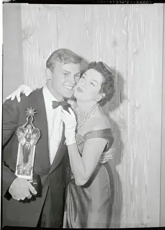 Rosaling Russell Kissing Tab Hunter on the Cheek
