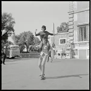 Rosemary Dexter and Dan Vadis Riding Skateboard