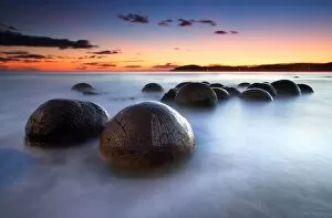 Images Dated 25th December 2010: Round boulders in water