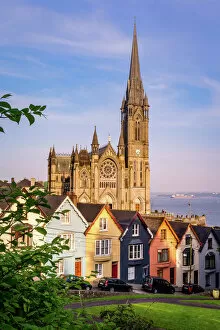 Urban Skyline Gallery: Row of colorful houses with cathedral background in Cobh, County Cork, Ireland