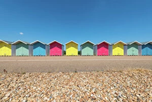 Images Dated 8th July 2018: A Row of Multi-Coloured Beach Huts along the Promenade, Eastbourne, East Sussex