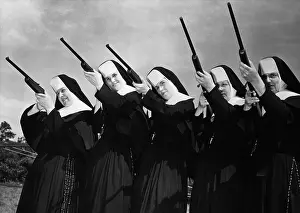 Habit Prints: Row of Nuns Aiming Rifles