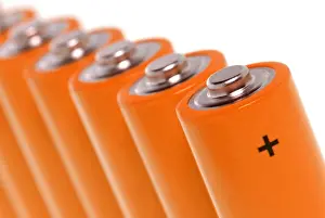 Signs Prints: Row of orange batteries