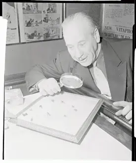 Roy Heckler Watching His Flea Circus Performing