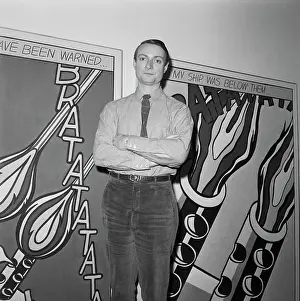 Roy Lichtenstein in Front of His Comic Book Inspired Art Work
