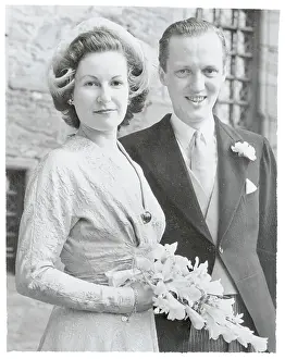 Royal Couple Posing at Their Reception