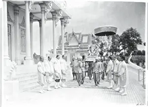 Royal Court Members Carrying King Monivong on Palanquin