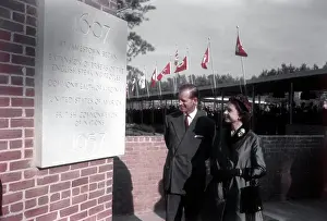 Prints of JAMESTOWN, VA - OCTOBER 16: Queen Elizabeth II and Prince Philip, Duke of Edinburgh look at a plaque commerorating the 350th anniverasy of the founding of the Jamestown colony in Jamestown, Virginia Queen Elizabeth II Prints: Royal Visit To Virginia