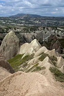 Southwest Asia Prints: Rugged landscape with weathered tuff formations