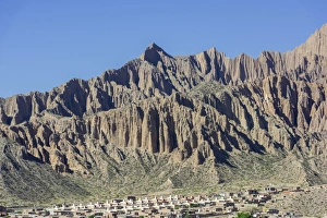 Images Dated 4th November 2012: Rugged mountain and a planned settlement, social housing, Tilcara, Jujuy Province, Argentina