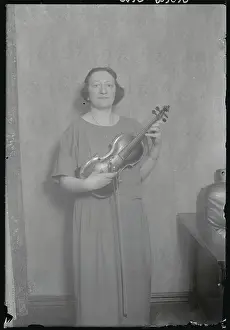 Rumanian Girl Holding Her Violin